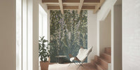 Wisteria blooms wallpaper mural accent wall behind a white bed frame.