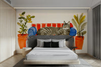 Cat Nap mural with watercolor-painted sleeping cat on couch

