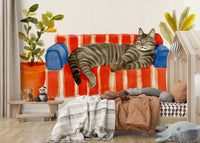 Watercolor wall art with feline curled up on cushions

