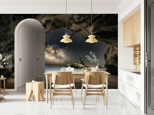 A beautiful cave portal wallpaper mural opening to a cosmic, starry sky.