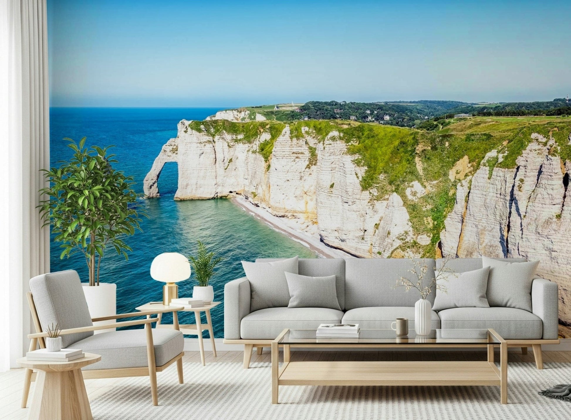 A calm sitting room softened by Chalk Cliffs Vista Wall Mural and open ocean views