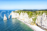 Chalk Cliffs Vista Wall Mural with white sea cliffs above clear blue coastal water