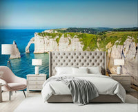 A bright bedroom framed by Chalk Cliffs Vista Wall Mural and sweeping coastal cliffs