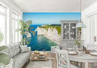 This dining nook feels more open with Chalk Cliffs Vista Wall Mural and blue water below
