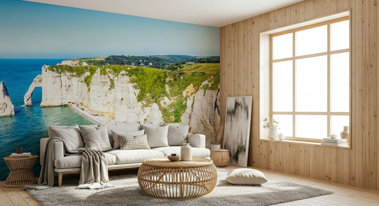 Chalk Cliffs Vista Wall Mural creates a breezy coastal setting for this warm lounge corner