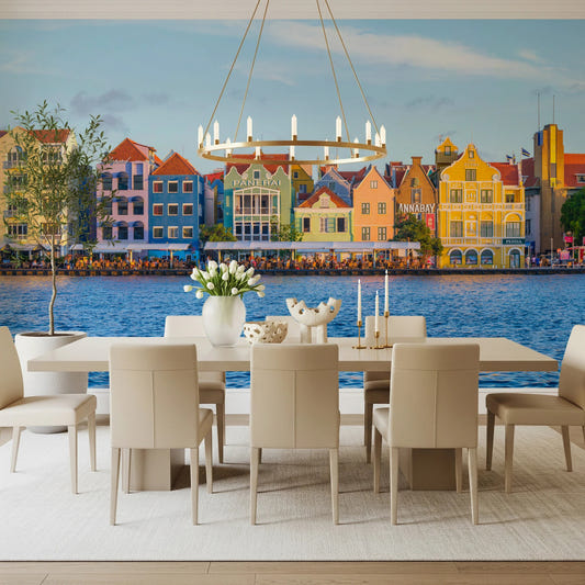 Dining area with Charming Harborfront Buildings Wall Mural and white table seating