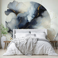 Moon-inspired wall mural with floating ginkgo leaves.

