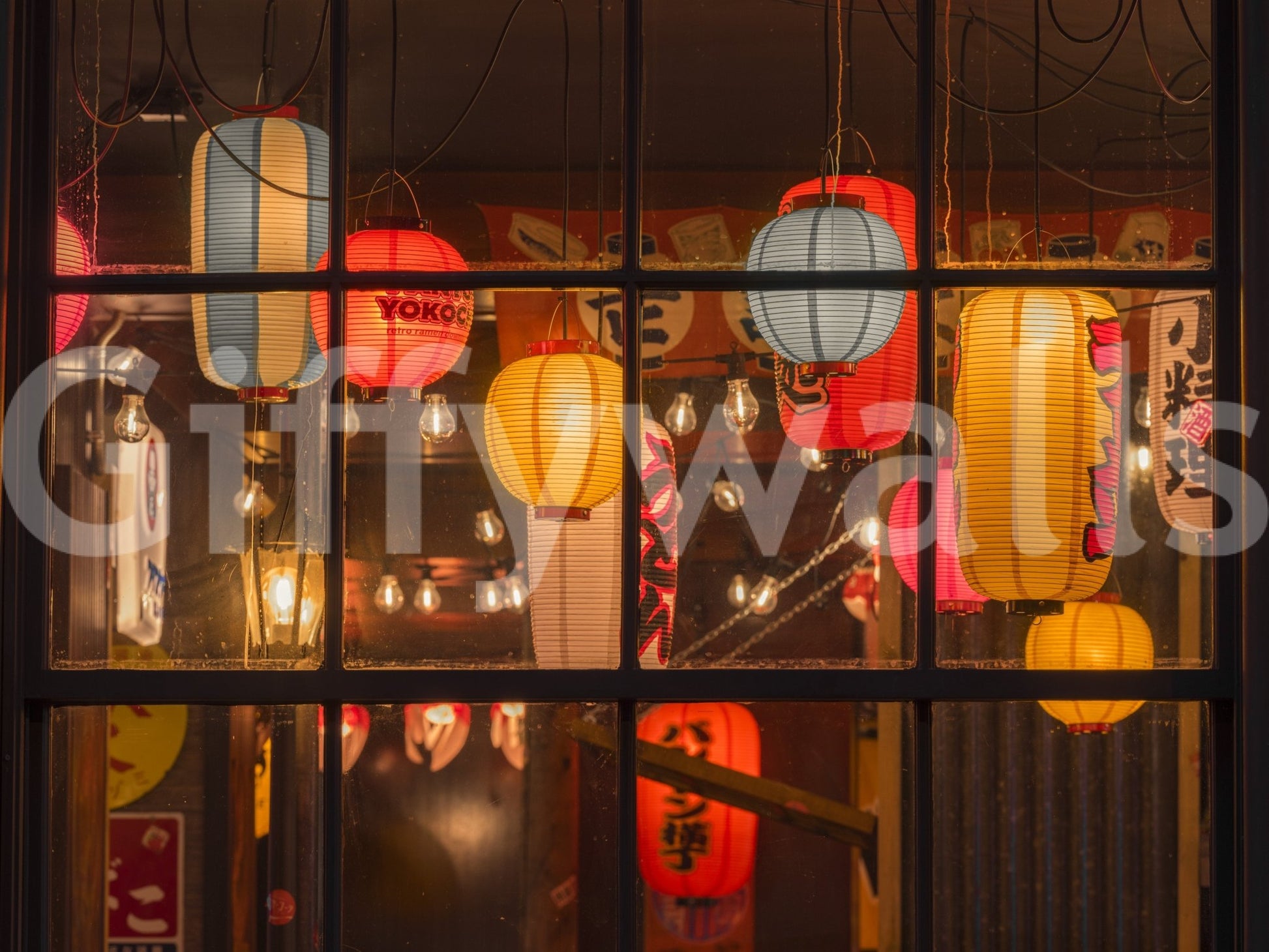 Festive lantern wall art with market scene


