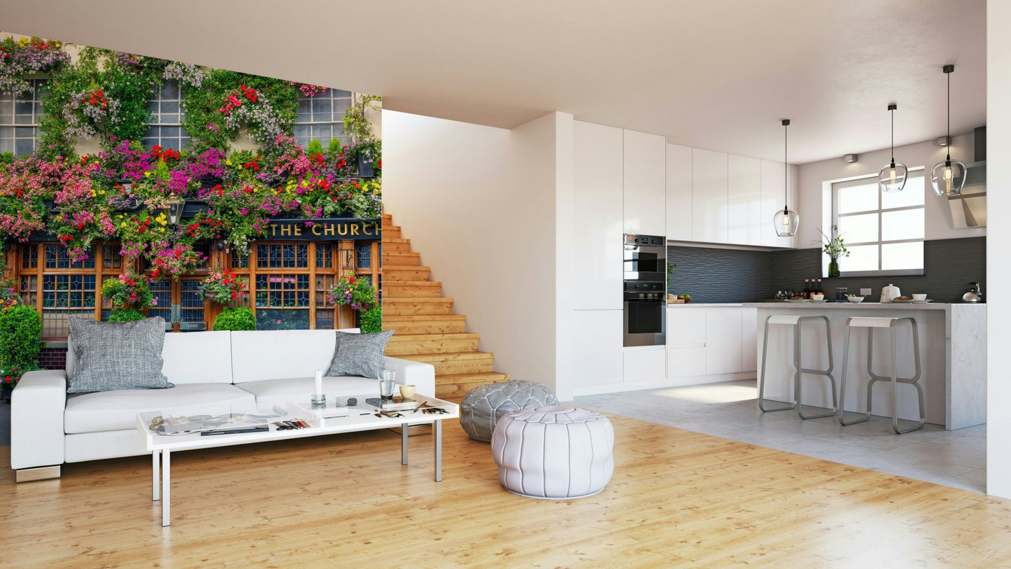 Mural of the Churchill Arms with stunning flower arrangements

