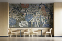 A high-angle view of the wall mural in a large space.

