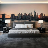 Behind the bed, City Lights at Dawn Wall Mural brings in a calm urban horizon