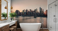 The bath area feels brighter with City Lights at Dawn Wall Mural by the tub