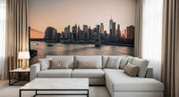 City Lights at Dawn Wall Mural sits neatly behind the sectional in this living room