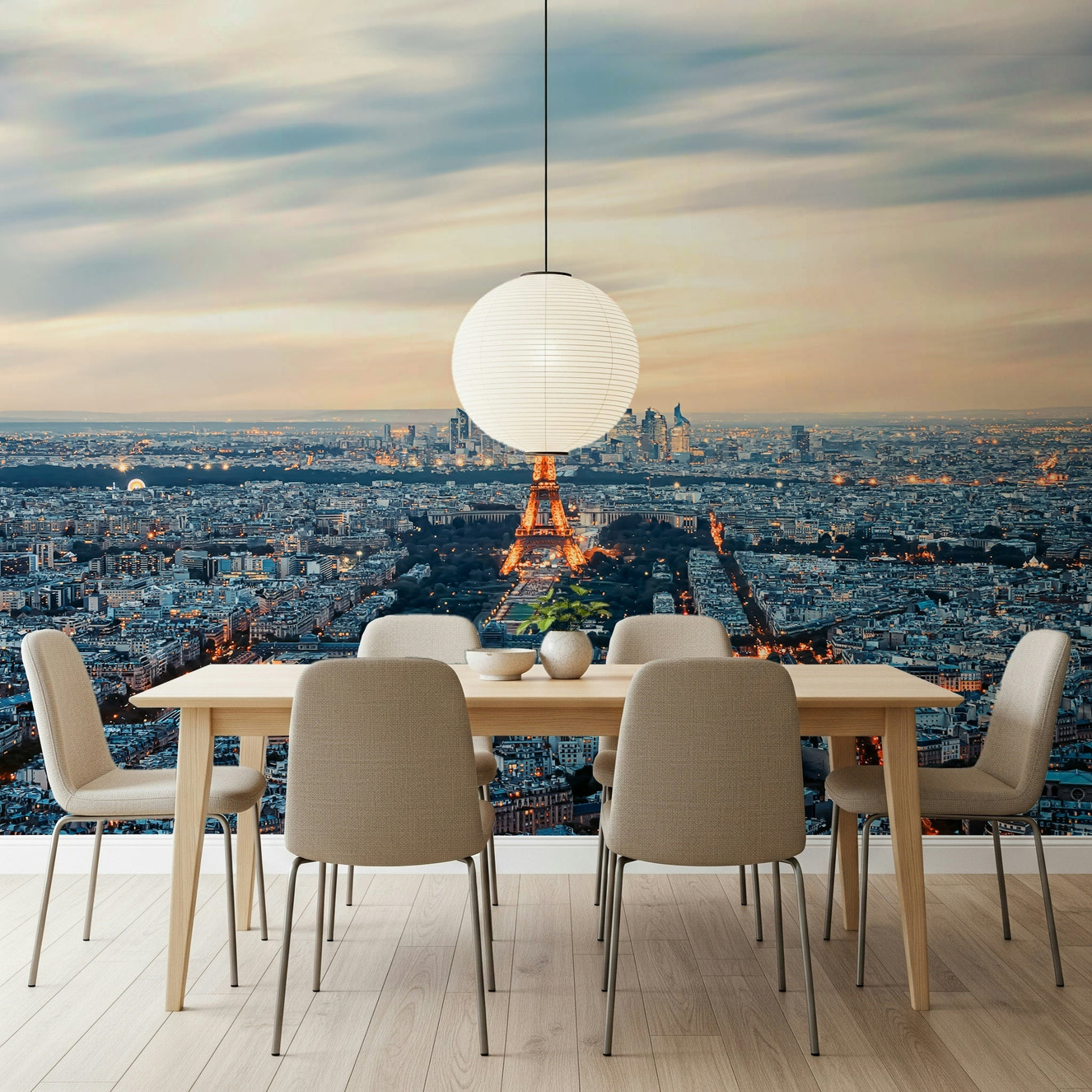 The dining area feels brighter with City of Lights Wall Mural and its central tower glow