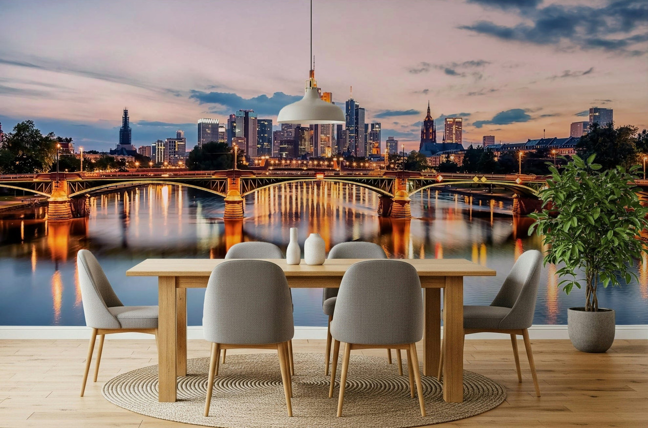 A modern dining room framed by City Reflections Wall Mural and glowing river lights