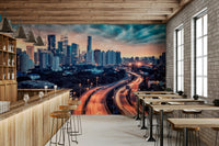 In the Cafe dining space, Cityscape Dawn Wall Mural adds depth with glowing road lines