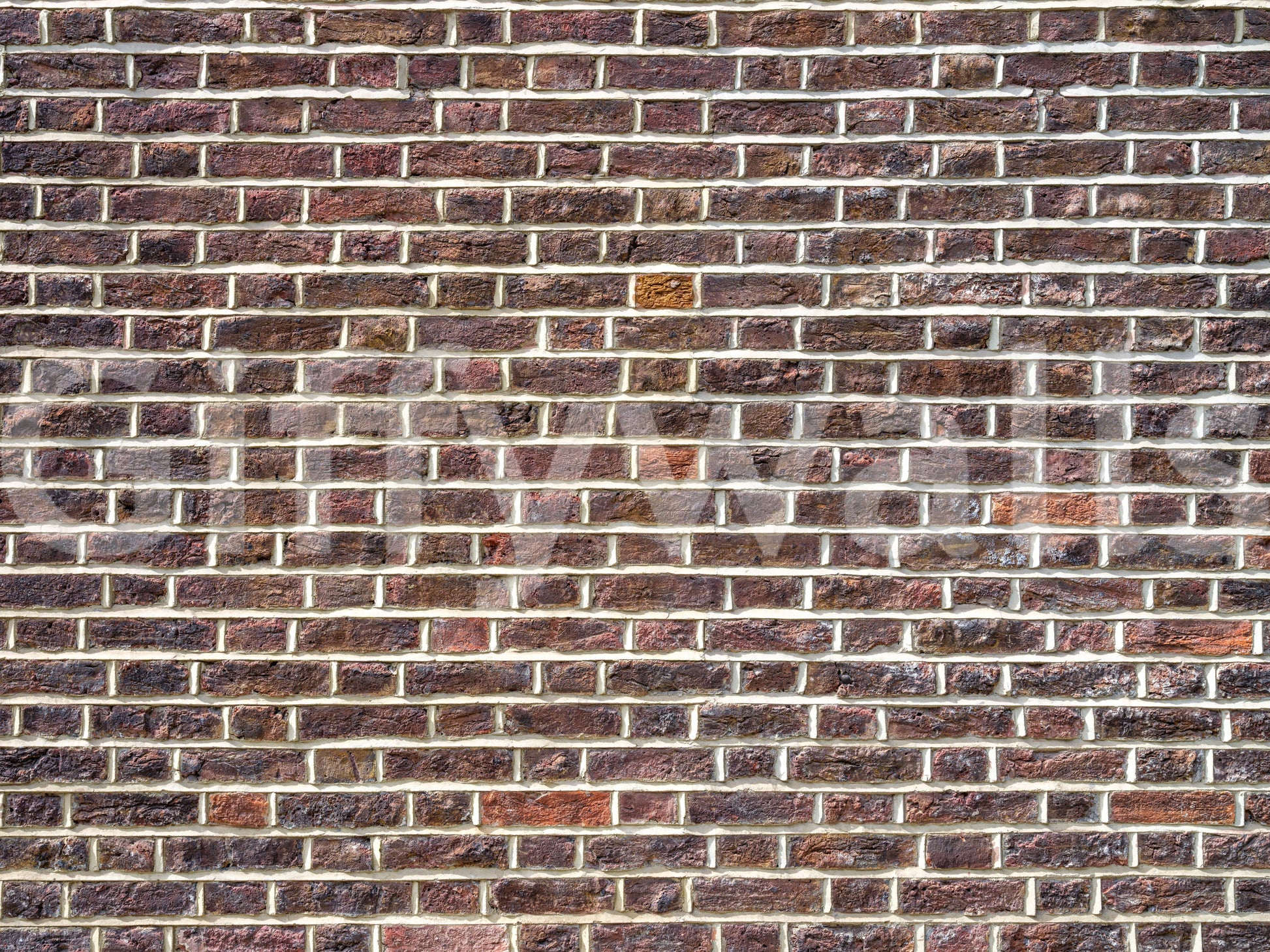 Old-school brick wall mural with raw texture

