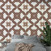 The color palette is warm and earthy, with shades of terracotta orange and brown.
