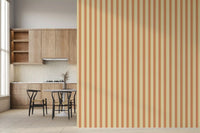 Dining space enhanced with Classic Vertical Stripes Wallpaper in peach and cream