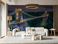 Grand architectural mural, cables spanning dark forest and rocky chasm.