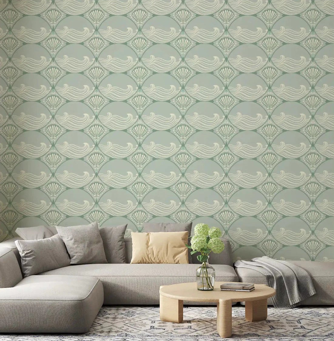Living room wall featuring Coastal Deco Serenity wallpaper with soft sage shells, GD9089