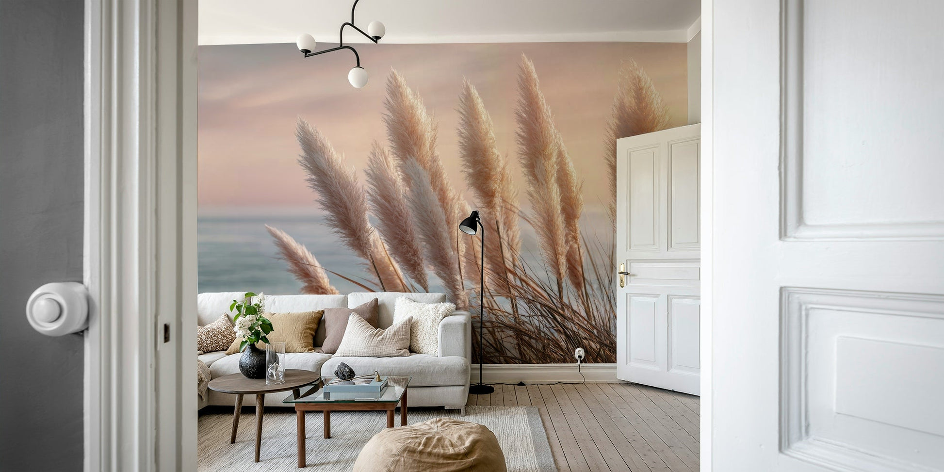 Calming seaside mural with waves and open sky

