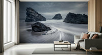 A beautiful abstract coastal wallpaper mural with monolithic, geometric shapes.