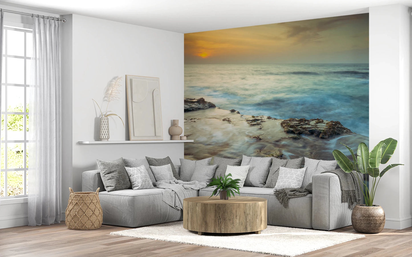 Modern living room displays Coastal Radiance Wall Mural with rocky tide view, GD8634