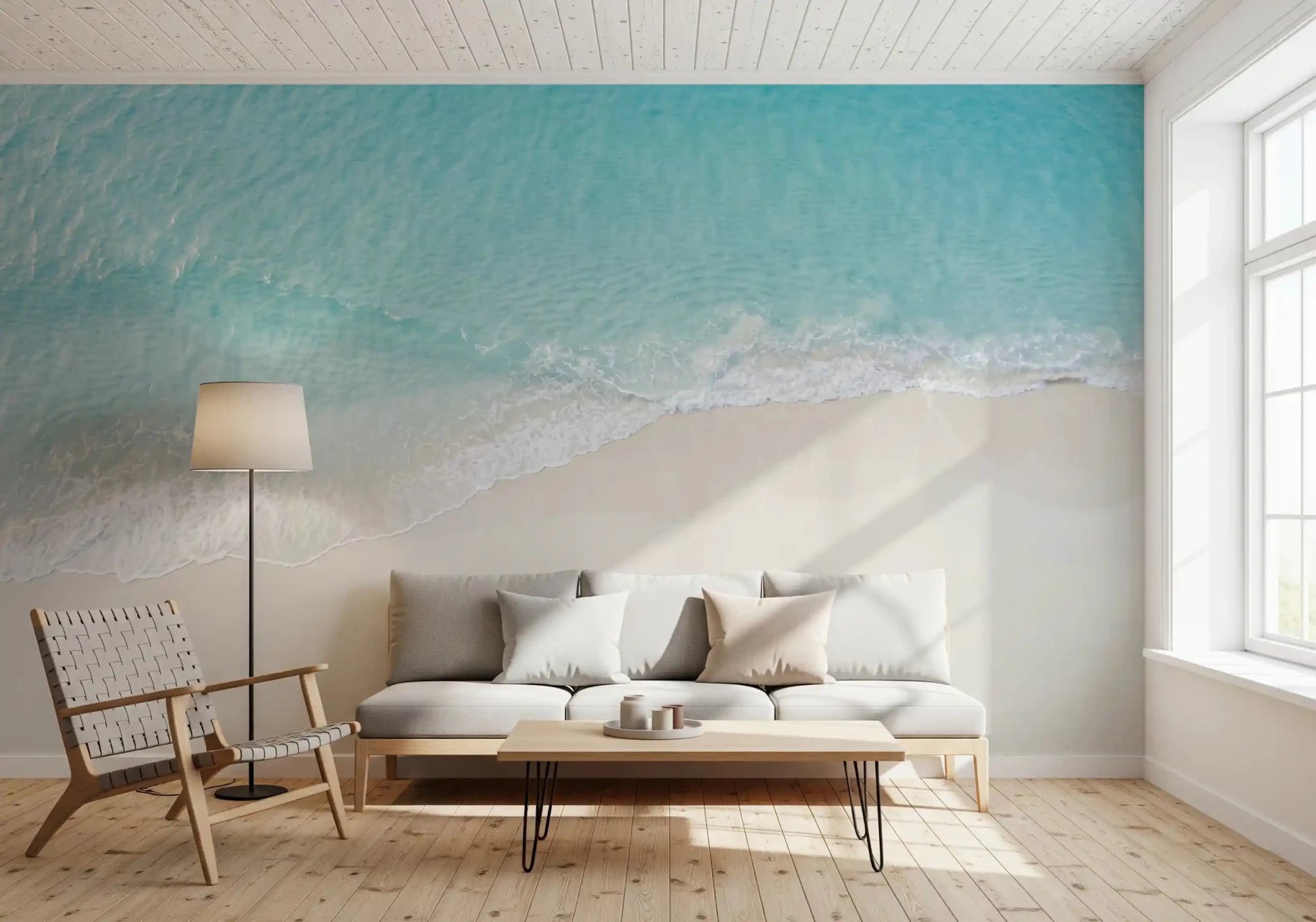 Coastal Serenity mural showing soft waves and white sand