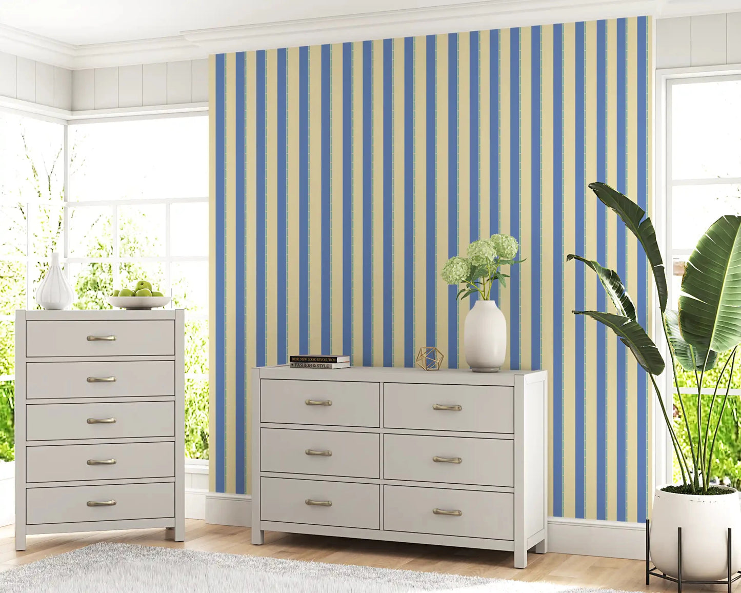 lounge corner setting softened by Coastal Stripes Wallpaper in blue beige tones