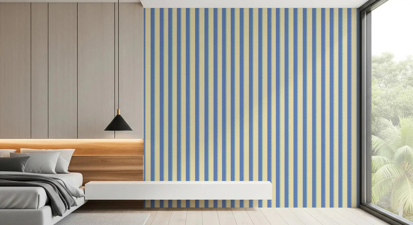 A low bed corner finished with Coastal Stripes Wallpaper in slim stripe detail