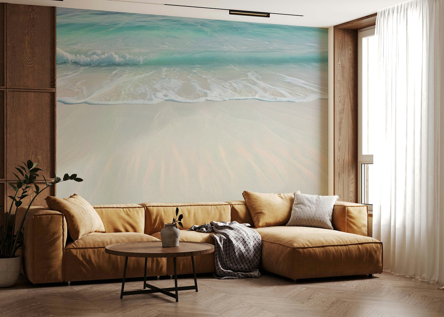 Aerial beach scene wallpaper with light blue ocean water and soft sand textures in an apartment.