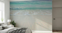 Modern beach landscape wall mural in soft pastel colors for a master bedroom.