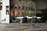 The colors are muted, with the stone's texture and warm interior lights.

