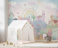 Adorable llama mural with cacti and hills
