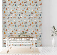 Soft blue cat wallpaper with playful illustrated felines