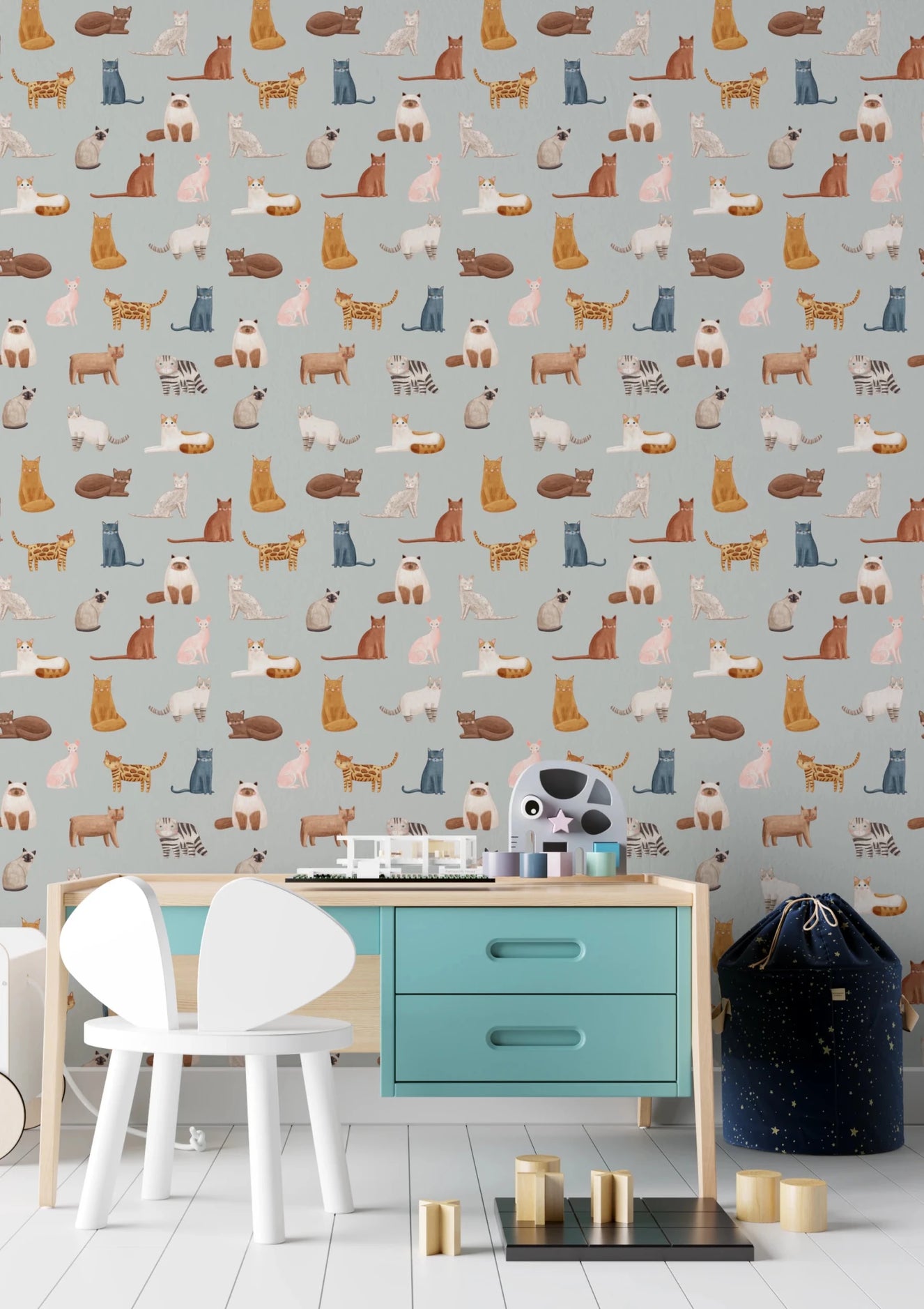 Playa area with Blue Wallpaper featuring illustrated cat figures