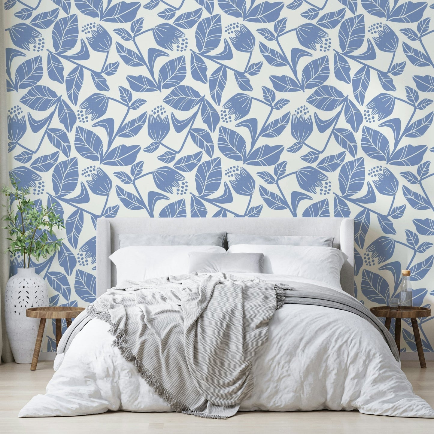 Botanical wallpaper with soft blue flowers

