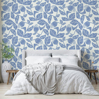 Botanical wallpaper with soft blue flowers


