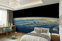 The cosmic shapes are a central focus of the image.

