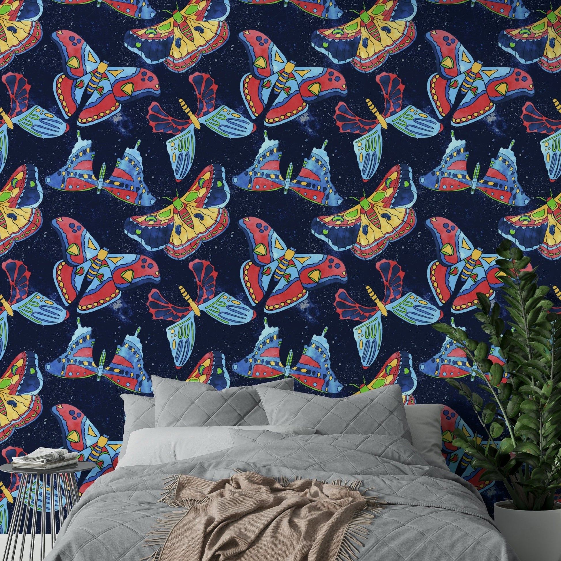 Moody wallpaper design with nebula-inspired colors and moth patterns.

