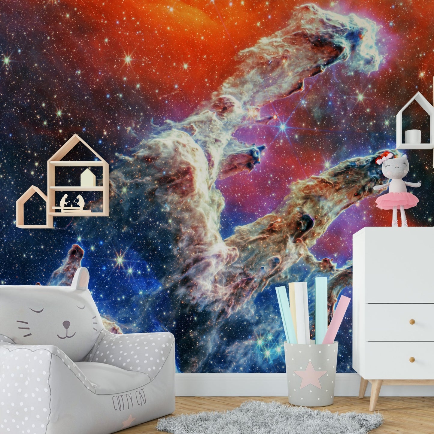 The mural gives the illusion of a window looking out onto a beautiful cosmic scene.
