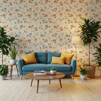 Soft floral wallpaper with scattered blossoms on a calm cream background