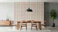Warm living room decor using the Cozy Checkered Warmth Wallpaper.