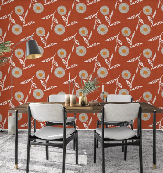 Dining corner energized by burnt terracotta floral wallpaper with a warm crafted feel
