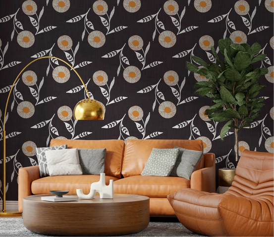 Warm lounge corner anchored by charcoal floral wallpaper and soft caramel seating, GD8611