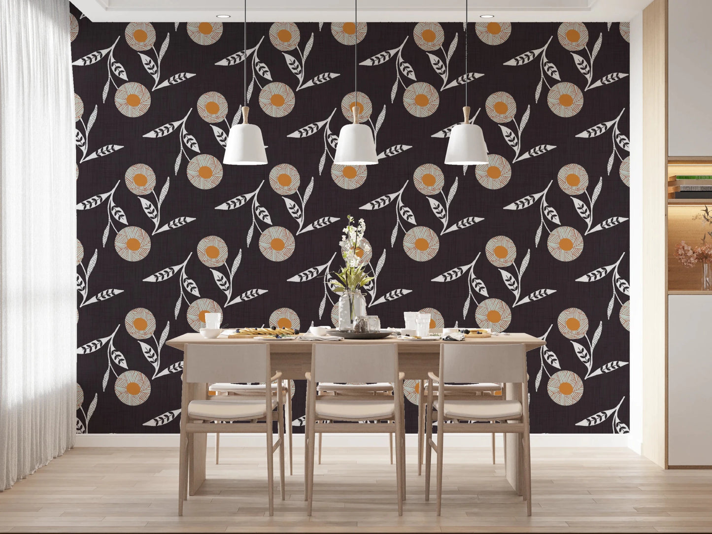 Dining setting styled with moody botanicals and airy leaf movement throughout