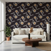 Compact living spot lifted through ivory blossoms on a rich charcoal surface