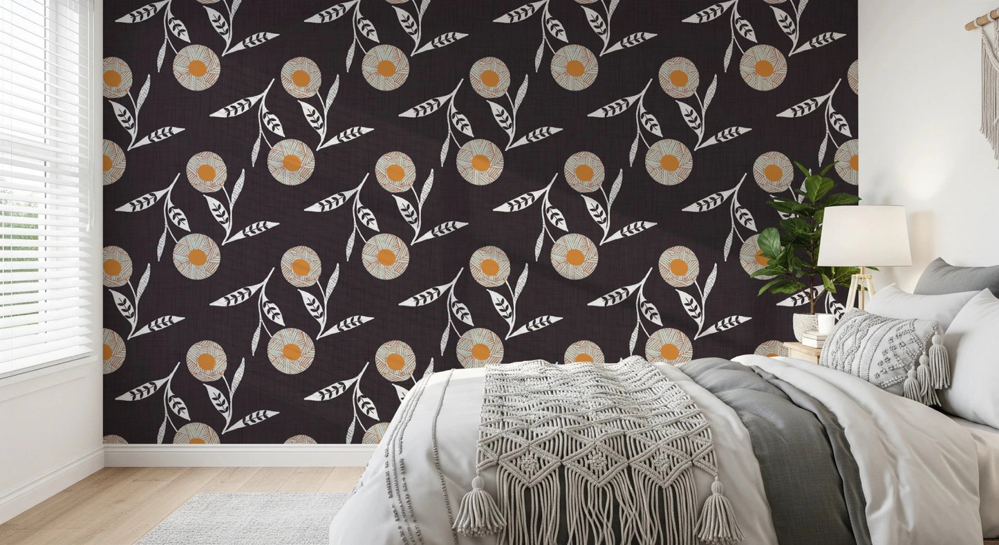 Restful bedroom backdrop finished in charcoal botanicals with light leafy detail