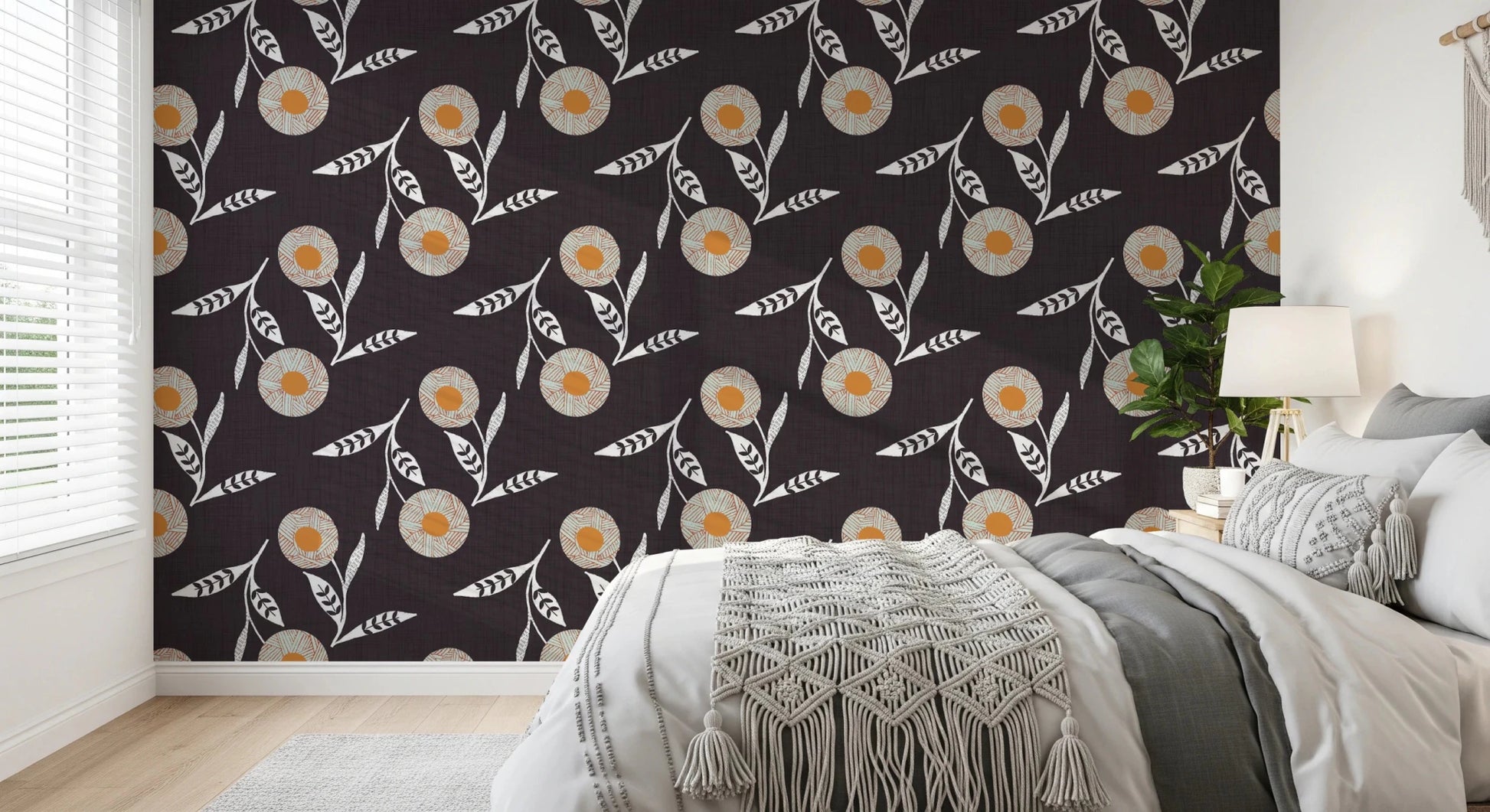Restful bedroom backdrop finished in charcoal botanicals with light leafy detail
